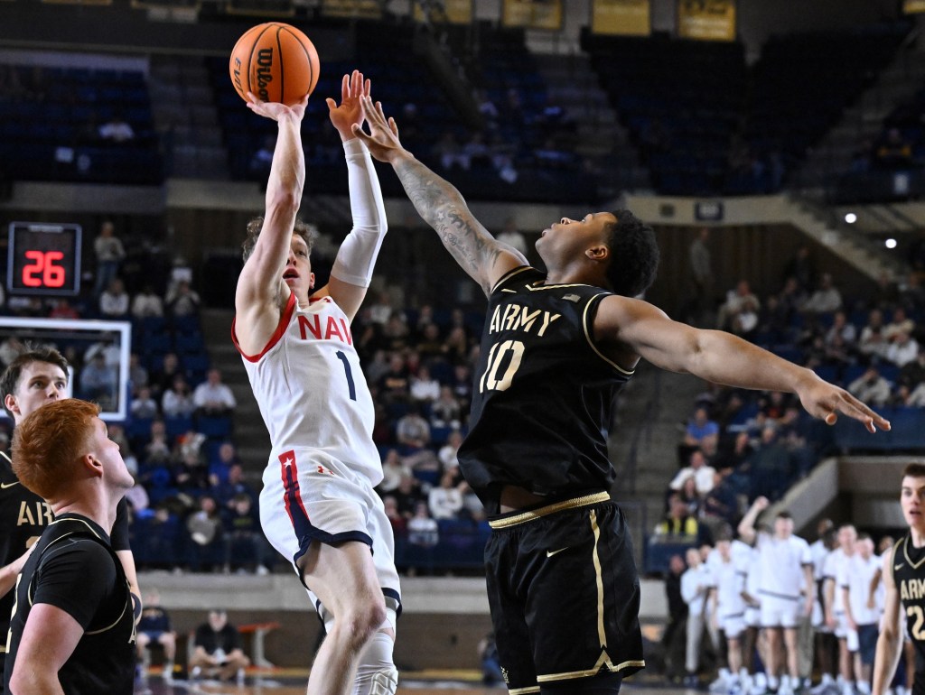 Navy men’s basketball routs Army, 84-56, as Austin Benigni leads the way